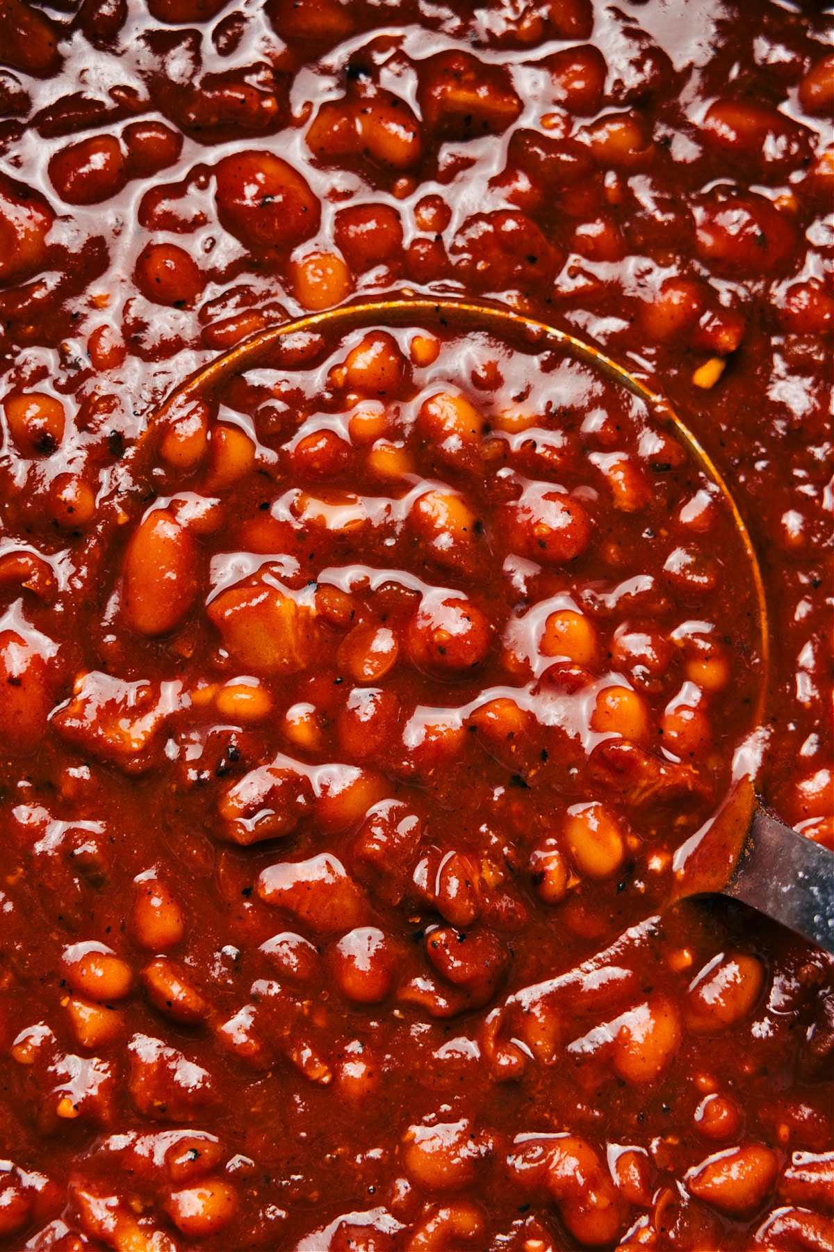 Flavorful And Delicious Baked Beans Recipe Baked beans in a pot, hot and ready to be served as the ultimate side dish.