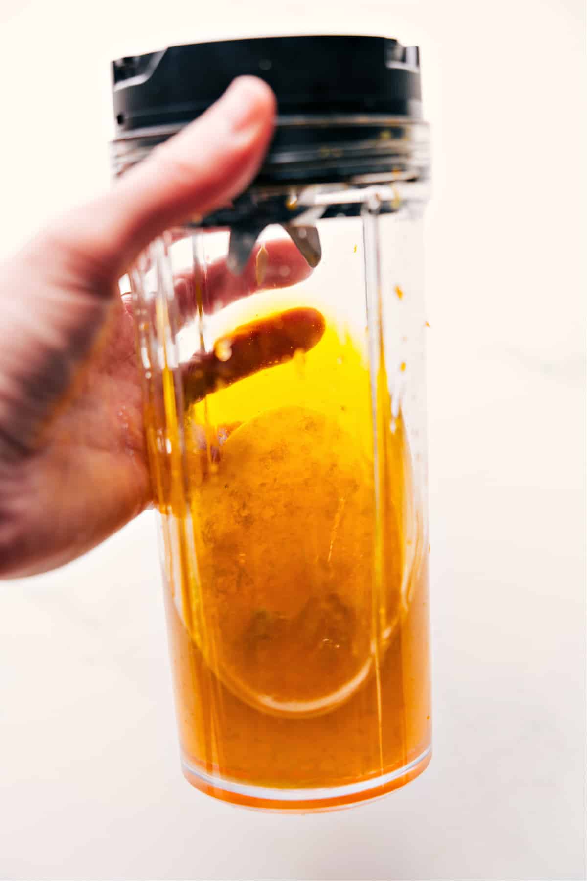 How To Make The Best Dressing For Peach Salad All the dressing ingredients are added to a blender and blended until smoothโthe perfect finishing touch for this peach salad.