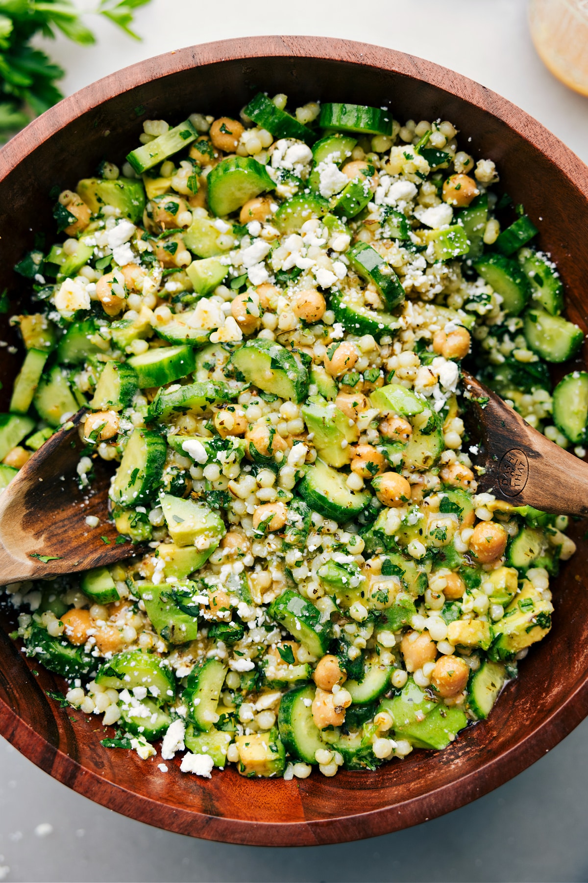 Easy Cucumber Feta Salad Recipe Cucumber feta salad tossed with dressing and ready to be served.