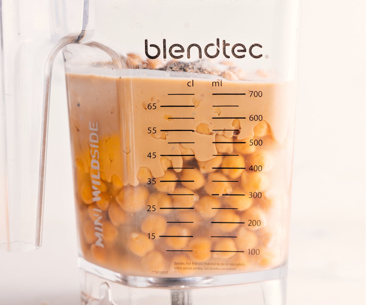 How To Make Hummus All the ingredients go into a blender and blend together for this hummus.