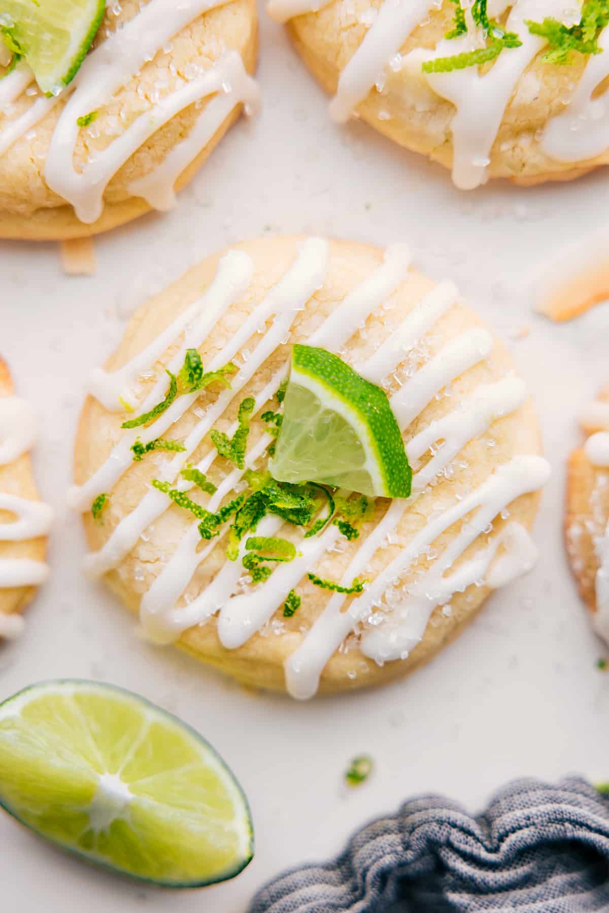 The Absolute Best Lime Cookies Lime cookie recipe freshly baked with a sweet lime glaze drizzled on top and fresh lime zest.