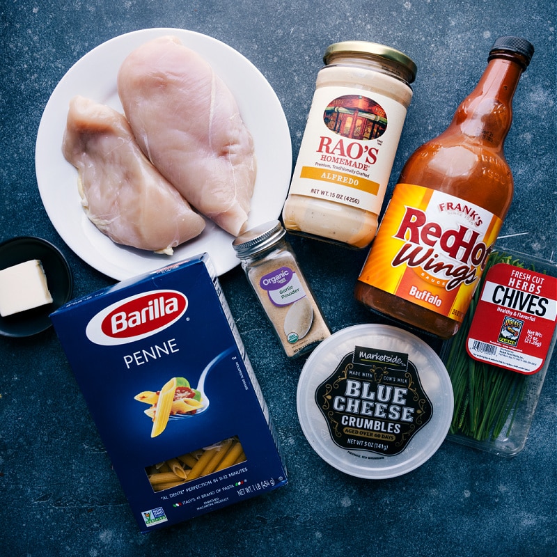 This Buffalo Chicken Pasta packs a serious punch of flavor and is so easy to make thanks to some ingredient short-cuts. Recipe via ChelseasMessyApron #dinner #quick #easy #simple #familyfriendly #kidfriendly #buffalo #chicken #pasta Ingredient shot-- image of all the ingredients used in this dish