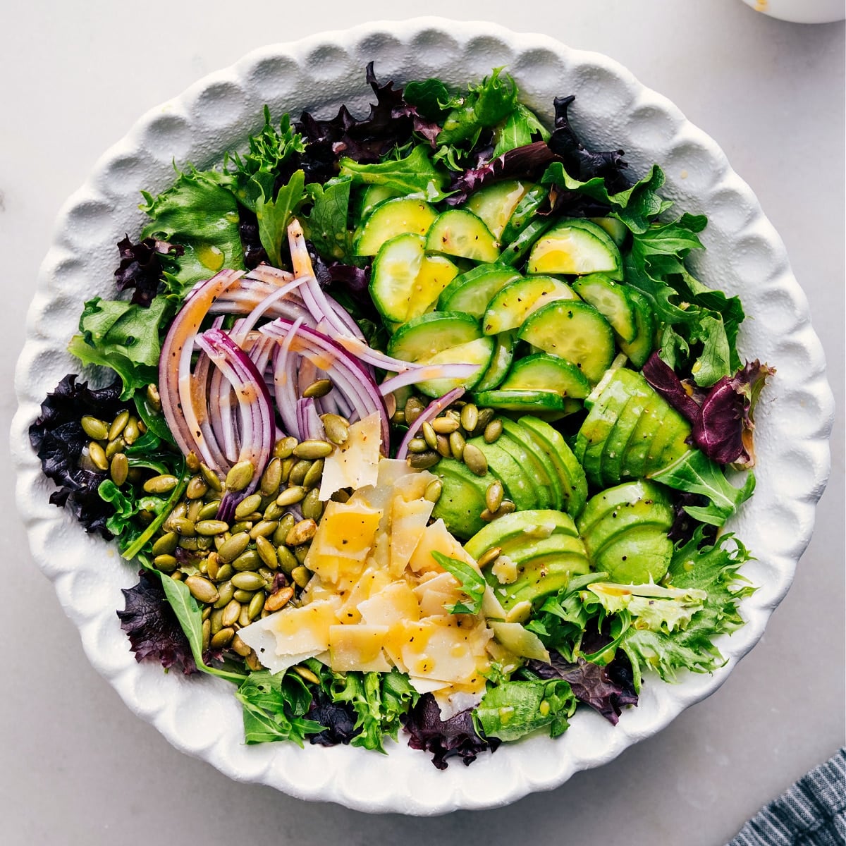 How To Make An Everyday Salad Recipe Pour the dressing over the dish.