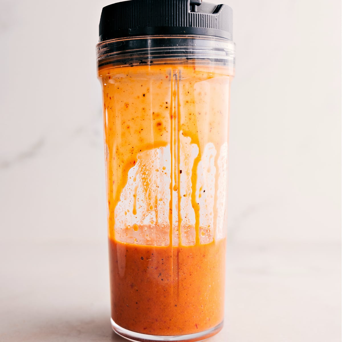 Simple And Delicious Chipotle Vinaigrette Blending chipotle vinaigrette together.