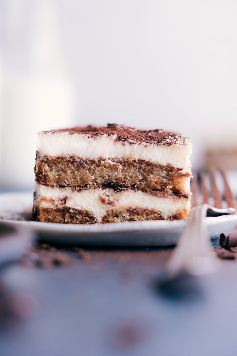 No Bake Tiramisu Recipe That Tastes Like It Came Straight From Italy Slice of Tiramisu on a plate.