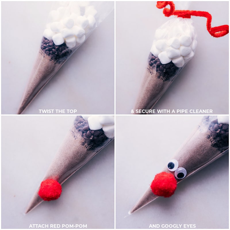 Reindeer Hot Chocolate -- the cutest edible gift this holiday season! Add hot chocolate mix, chocolate chips, and marshmallows to a cone-shaped bag and decorate to look like Reindeer (specifically Rudolph). Recipe via chelseasmessyapron #dessert #gift #christmas #holidays #christmasgifts #holidaygifts #rudolph #reindeer #hot #chocolate Process shots-- images of the pipe cleaner being added and the red pom pom and google eyes
