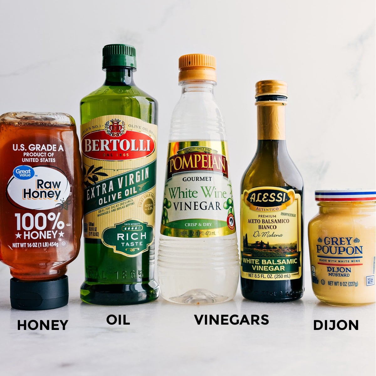 Dressing Ingredients In Arugula Salad Dressing ingredients prepped out for this arugula salad recipe.