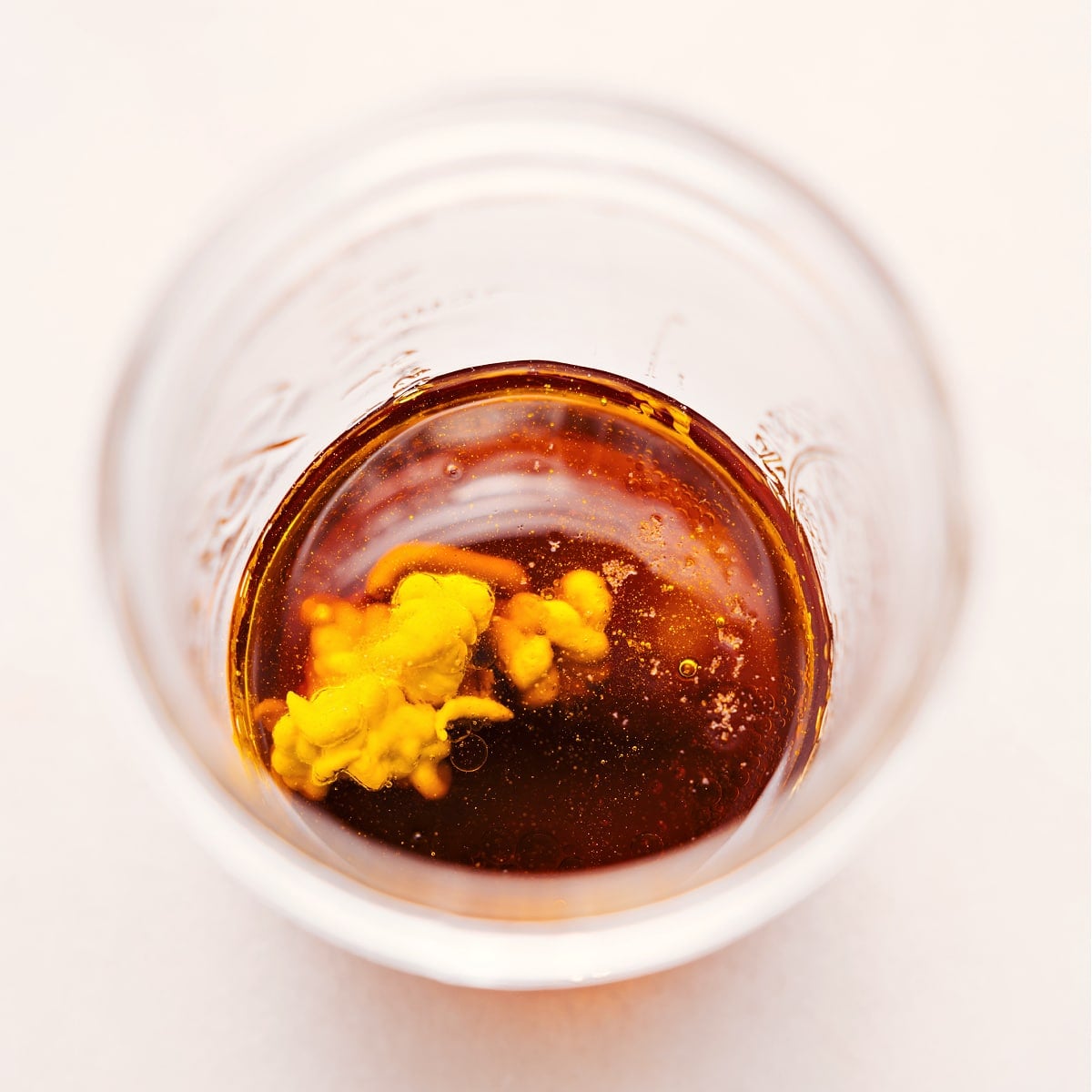 How To Make White Balsamic Vinaigrette All the ingredients for White Balsamic Vinaigrette are in a mason jar, ready to mix.