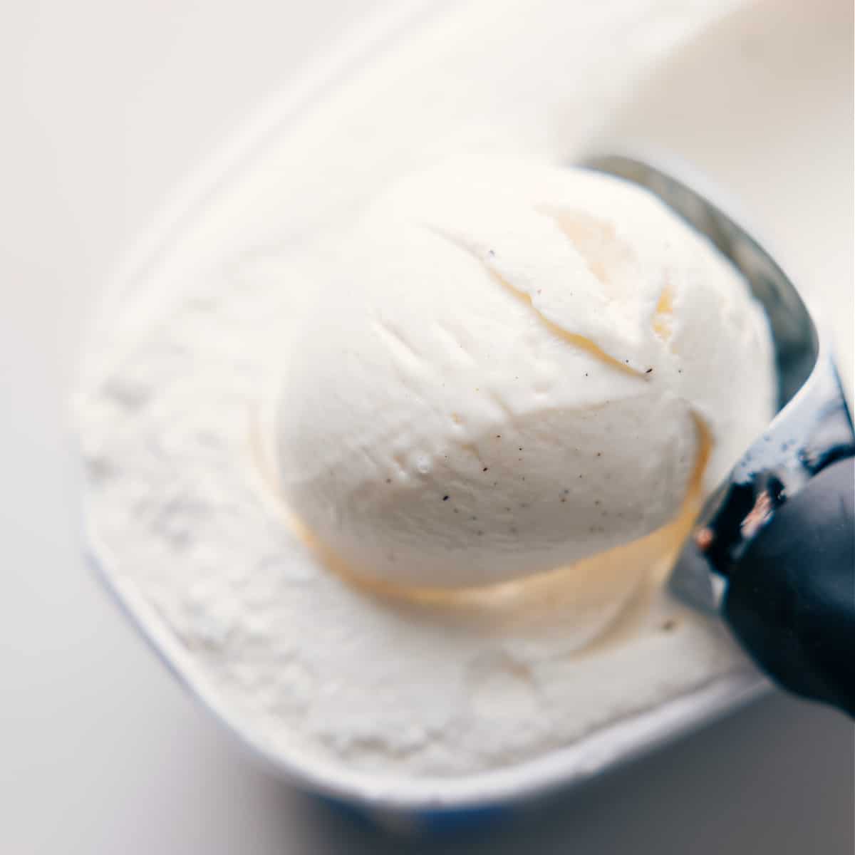 Vanilla Bean Ice Cream In Shamrock Shake Scooping vanilla bean ice cream into the blender.