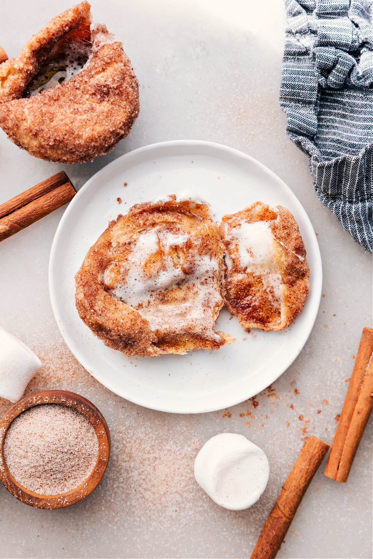 Empty Tomb Rolls For Easter A plate of Empty Tomb Rolls with the hollow centers clearly showing.