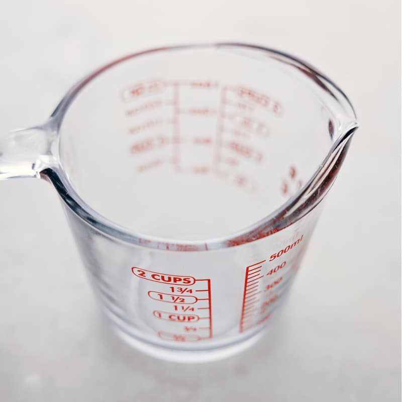 Improve your cooking skills and get precise measurements every time? Check out our guide to measuring ingredients, complete with a free printable Kitchen Conversion Chart! Simply download the chart, laminate it, and post it on the inside of a cabinet or in your pantry for quick reference. Recipe via chelseasmessyapron #free #kitchenconversionchart #chart Image of a liquid measuring cup for this free kitchen conversion kit