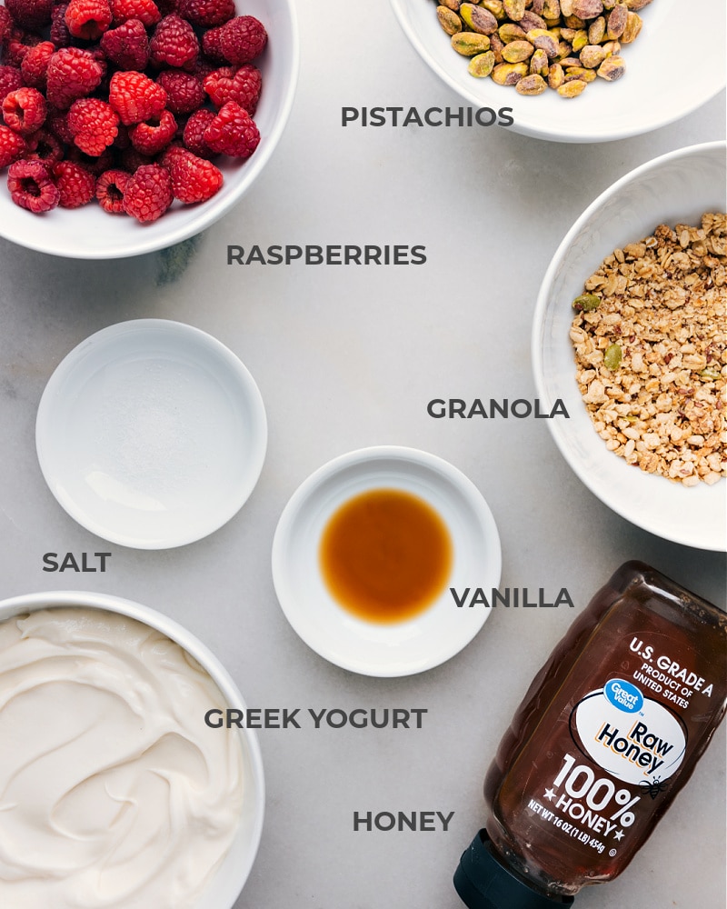 Our utterly irresistible Yogurt Bark features a creamy Greek yogurt and raspberry base, adorned with a medley of your favorite crunchy toppings. Recipe via chelseasmessyapron #snack #quick #easy #simple #healthy #toddlerfriendly #kidsnack #treat #yogurt #bark Ingredient shot-- image of all they ingredients used in this recipe