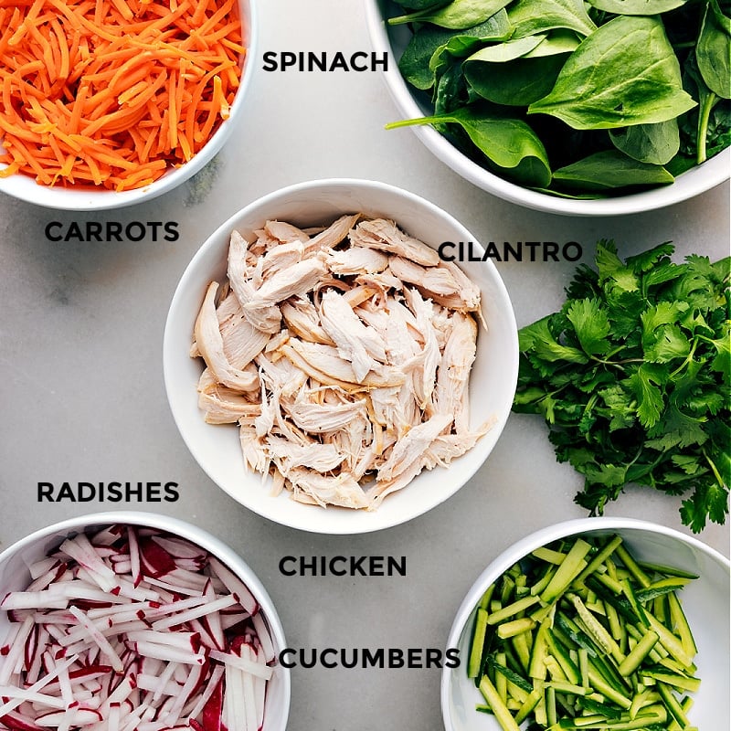 These Thai Chicken Wraps are a flavor explosion! Recipe via chelseasmessyapron #lunch #quick #easy #simple #familyfriendly #healthy #wholefoods #healthyeating #healthylifestyle #thai #chickenwraps All the ingredients used in this dish prepped out for easy assembly.