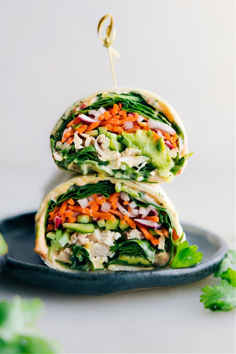 Thai Chicken Wraps Thai chicken wraps stacked on top of each other.