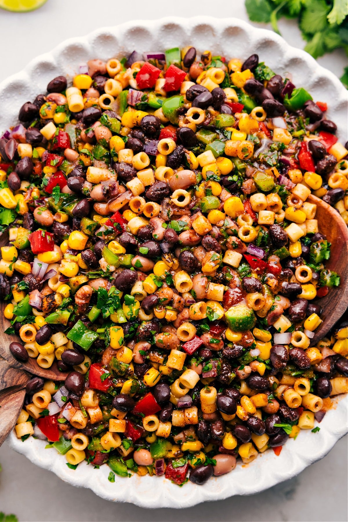 Cowboy Caviar Pasta Salad, dressed and tossed to perfection in a bowl.