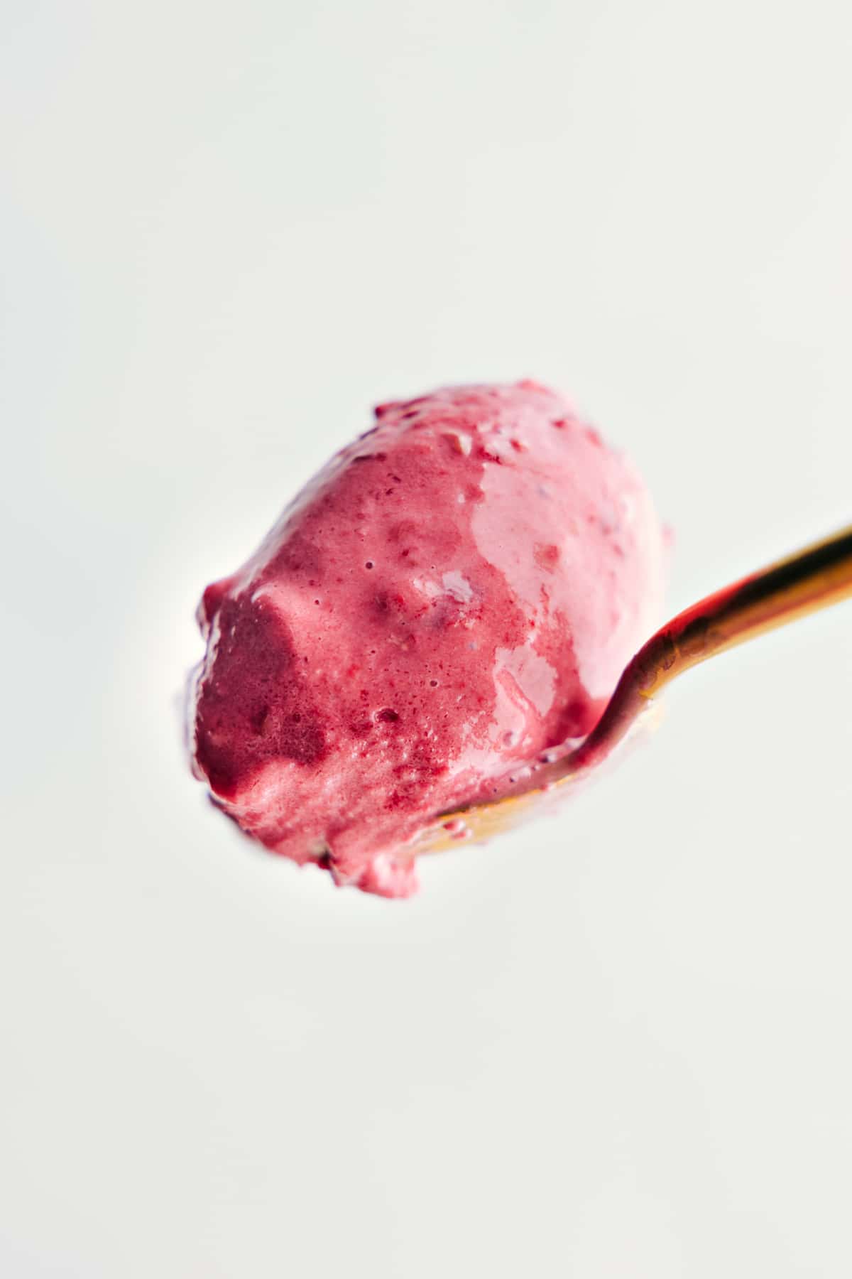 Eating The Best Frozen Yogurt A big spoonful of the frozen yogurt.