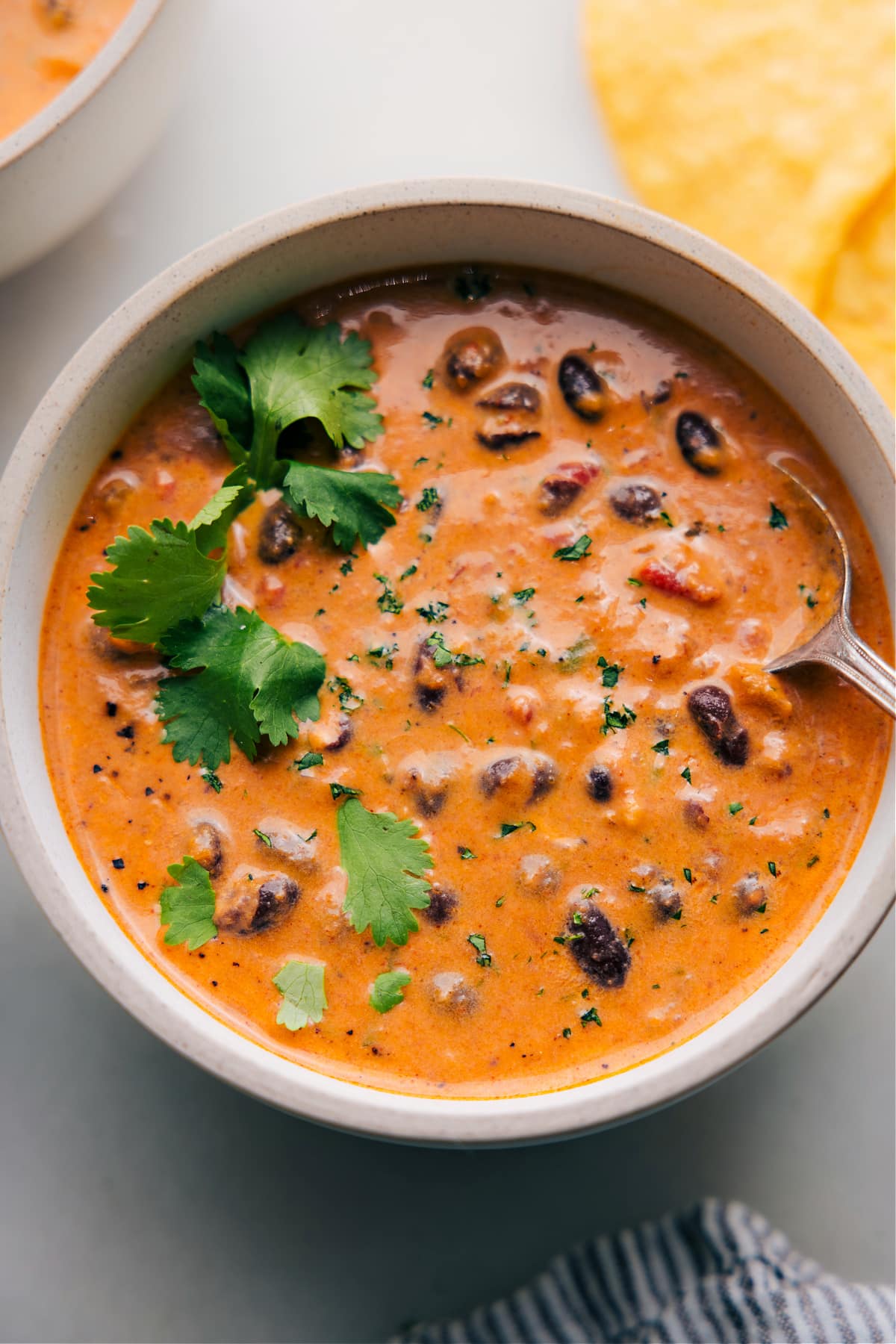 Bowl of Ready-to-Enjoy Pumpkin Black Bean Soup Overhead view of a bowl filled with Pumpkin Black Bean Soup, ready to be savored.