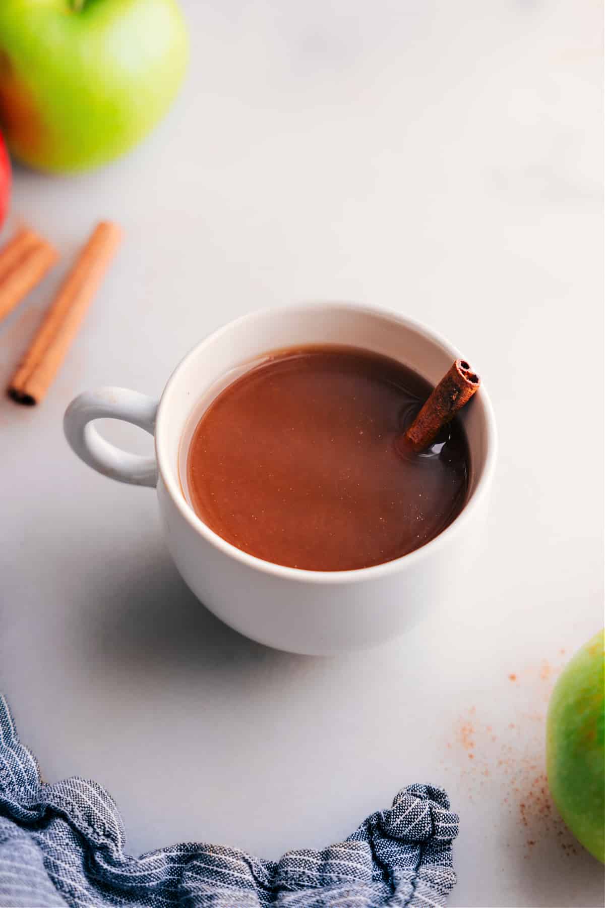 A steaming cup of this Hot Apple Cider Recipe.