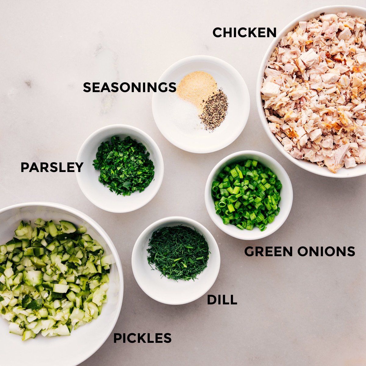 Ingredients In Dill Pickle Chicken Salad Prep all the dill pickle chicken salad ingredients for easy assembly: chicken, green onions, dill, parsley, pickles, and seasonings.