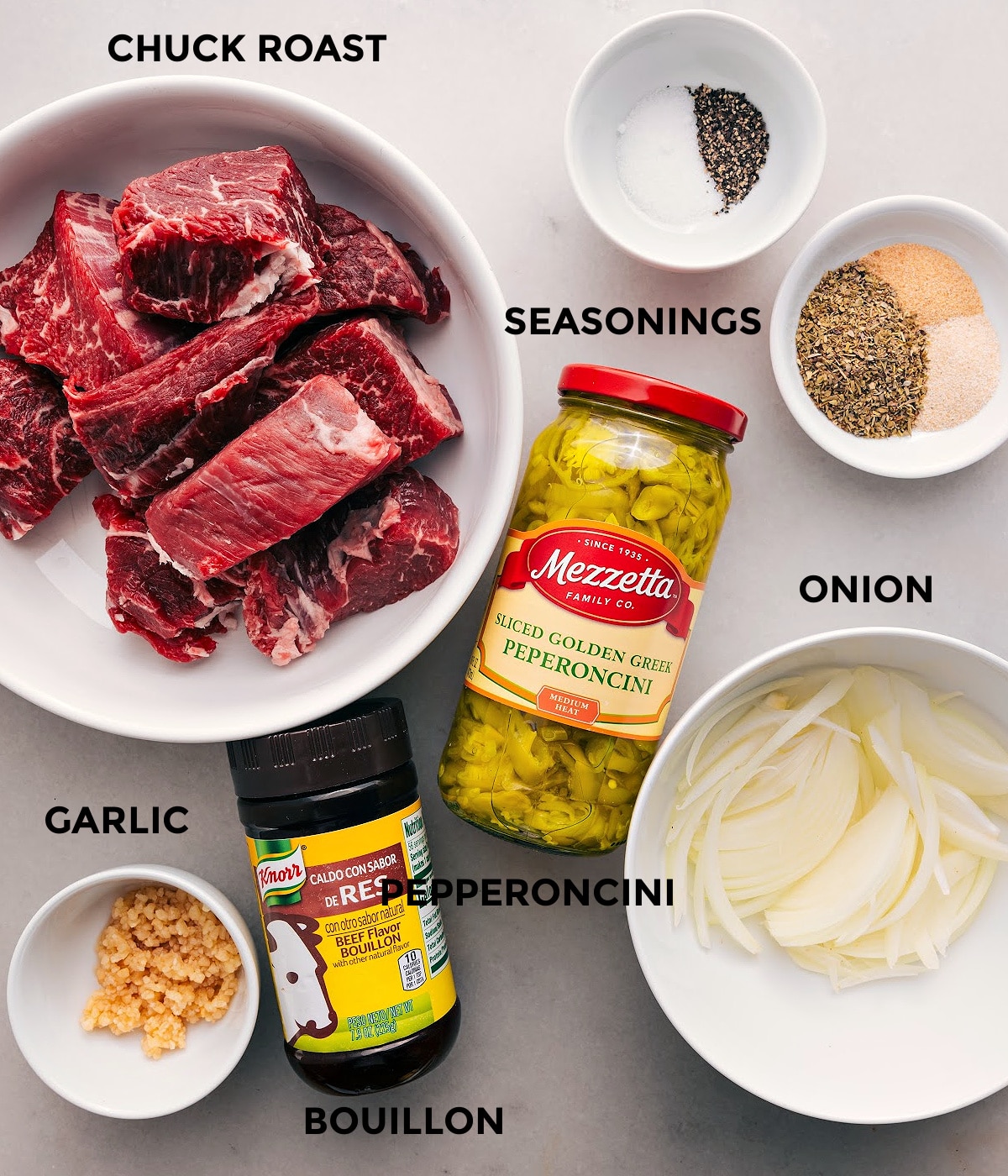 Ingredients In Italian Beef Sandwich All the ingredients in this recipe are prepped for easy assembly, including the meat, pepperoncini, onion, seasonings, garlic, and bouillon.