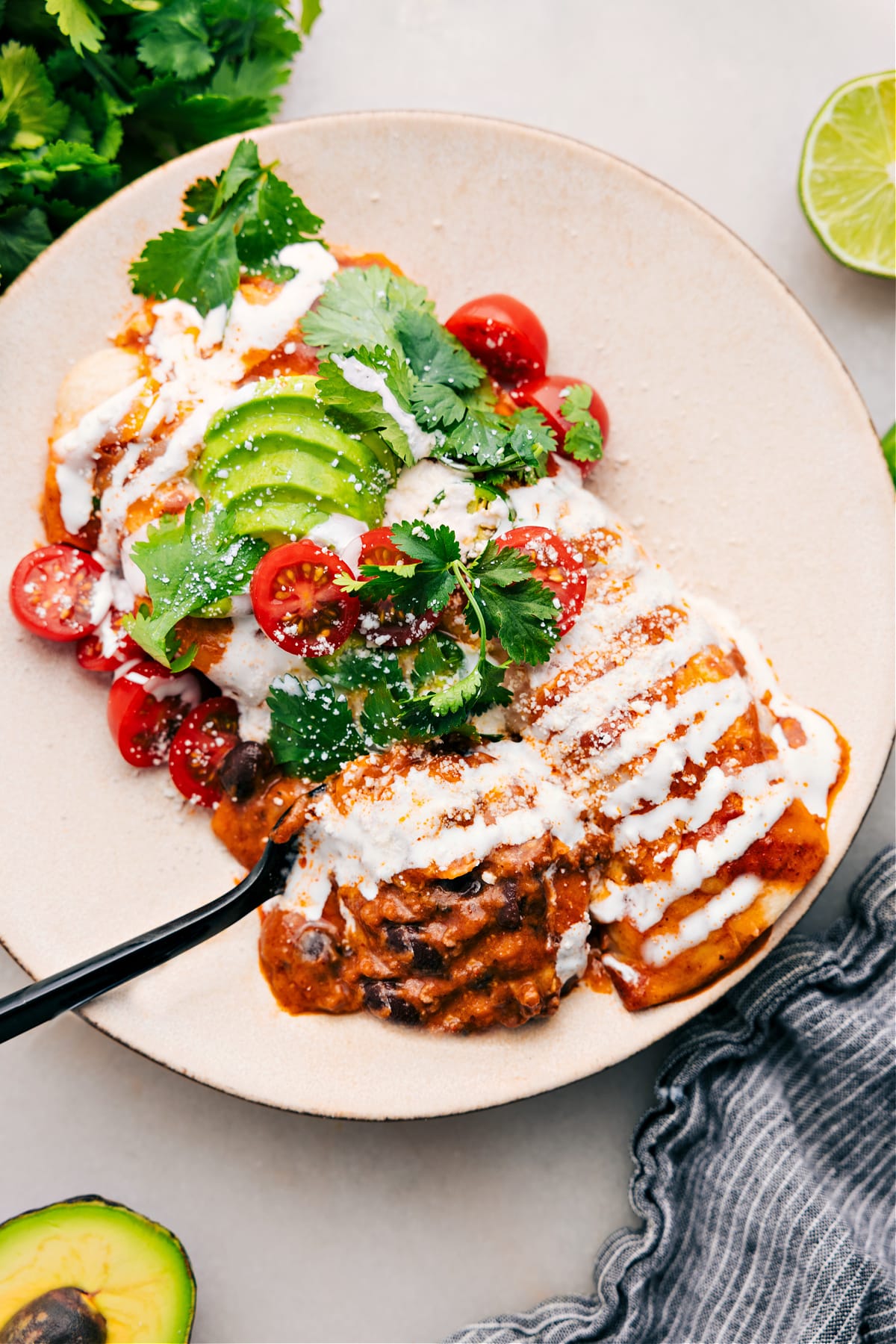 Ground Beef Enchiladas Recipe Ground Beef Enchiladas on a plate, ready to serve.