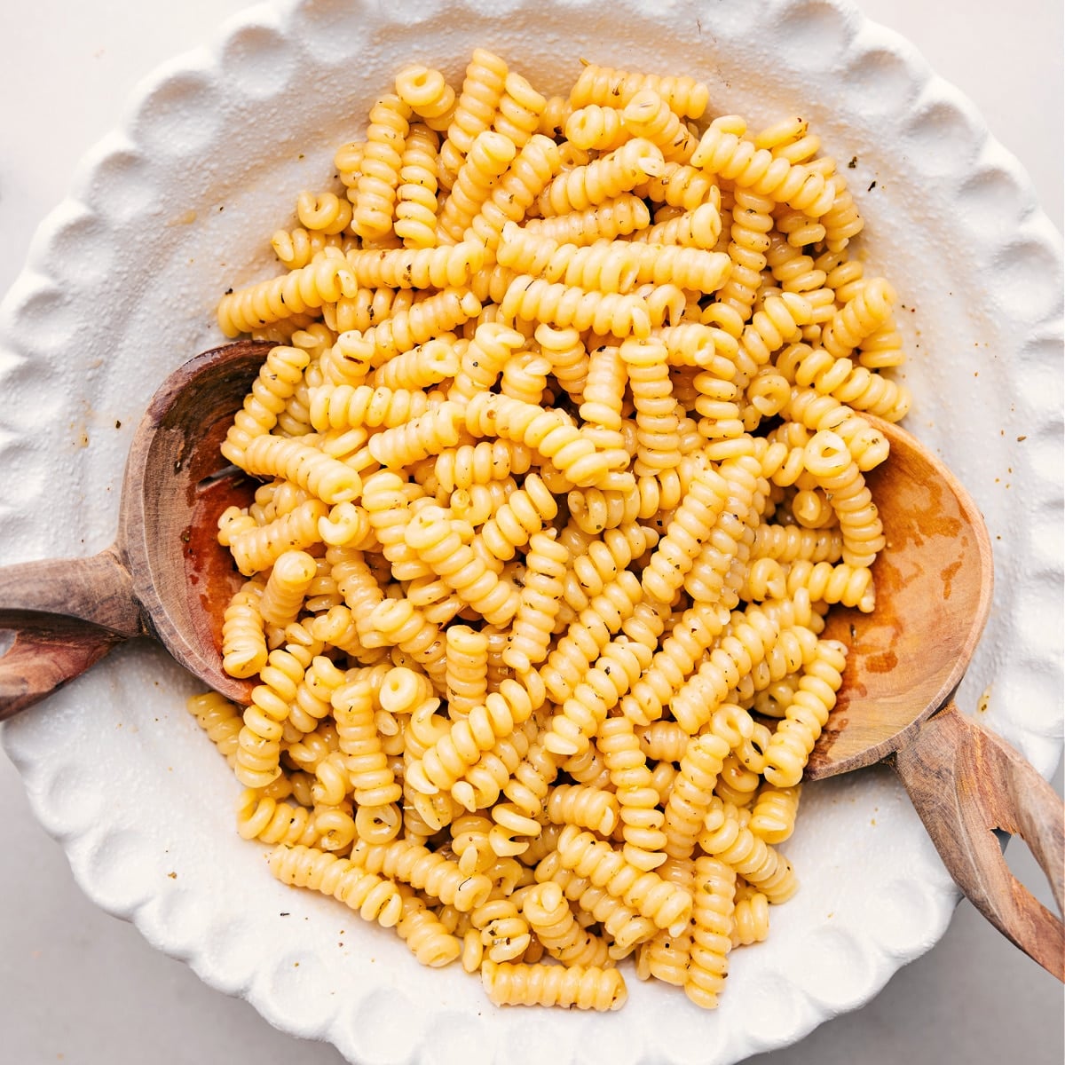 Cooked Pasta Tossed With Dressing Pasta tossed with some of the dressing for this marry me chicken pasta salad.