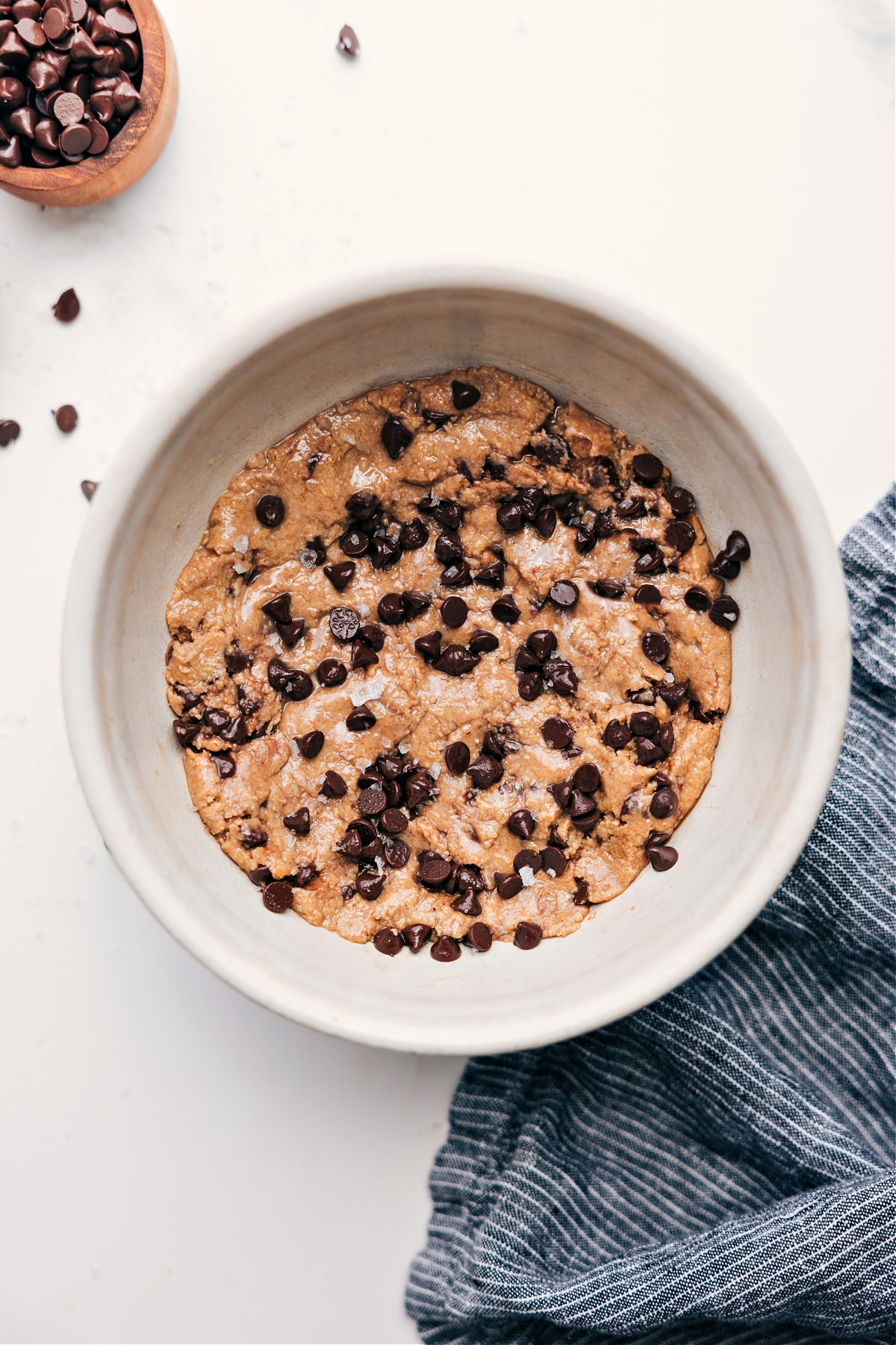 Chocolate chip protein cookie dough in a bowl.
