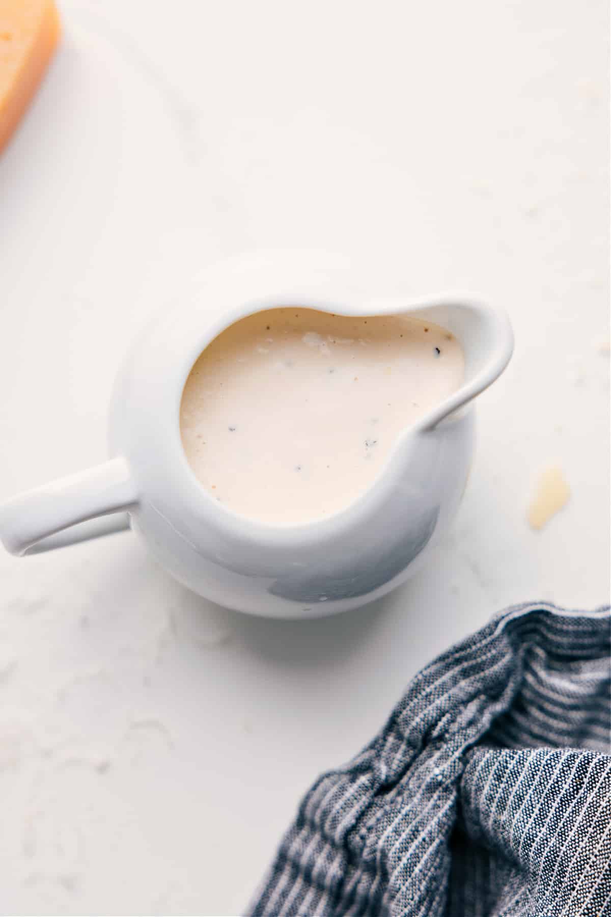 Caesar Dressing Recipe in the container ready to be enjoyed!