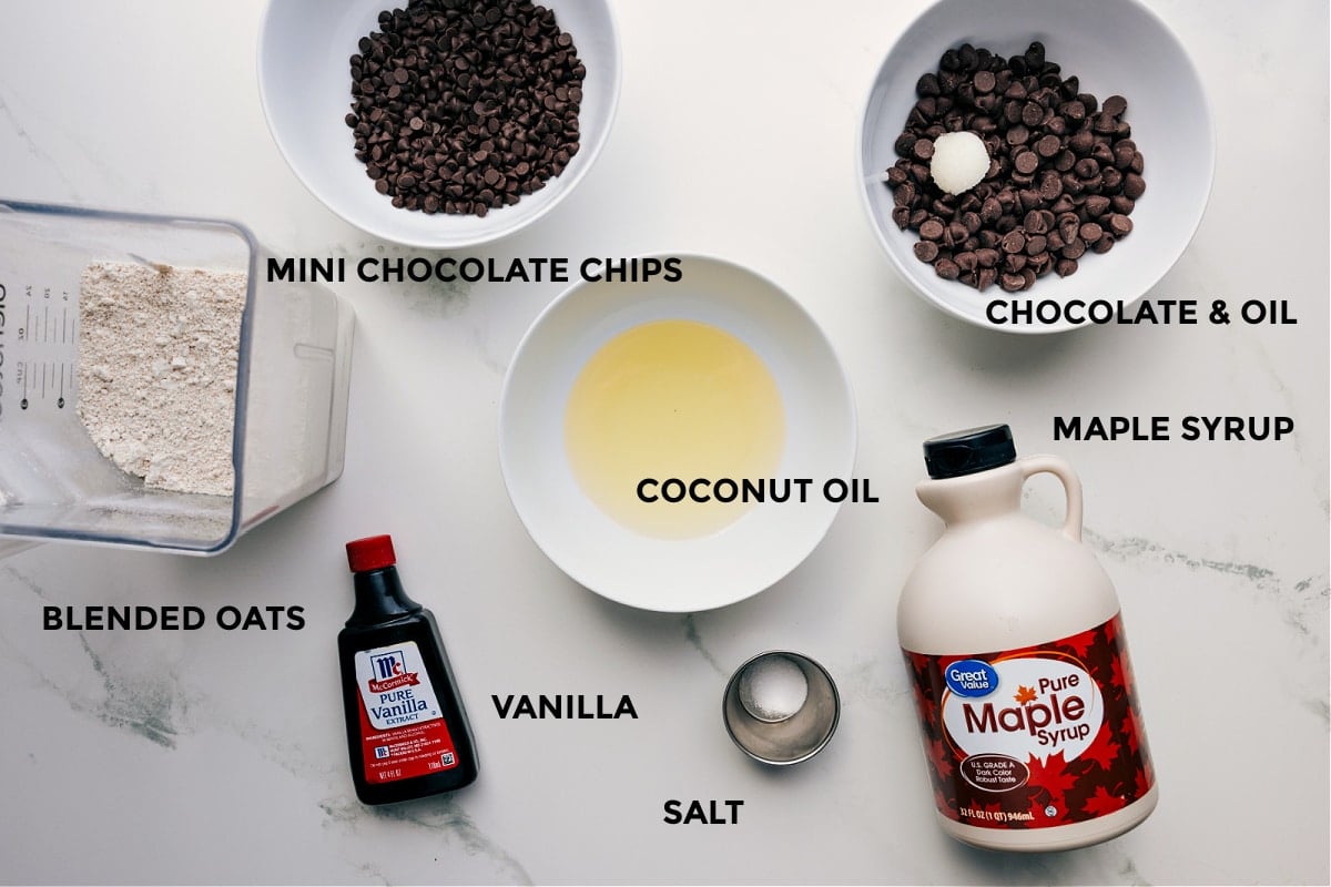 Ingredients In Cookie Dough Bark All the ingredients for this recipe are prepped and ready for easy assembly, including chocolate, coconut oil, maple syrup, vanilla, salt, and oats.