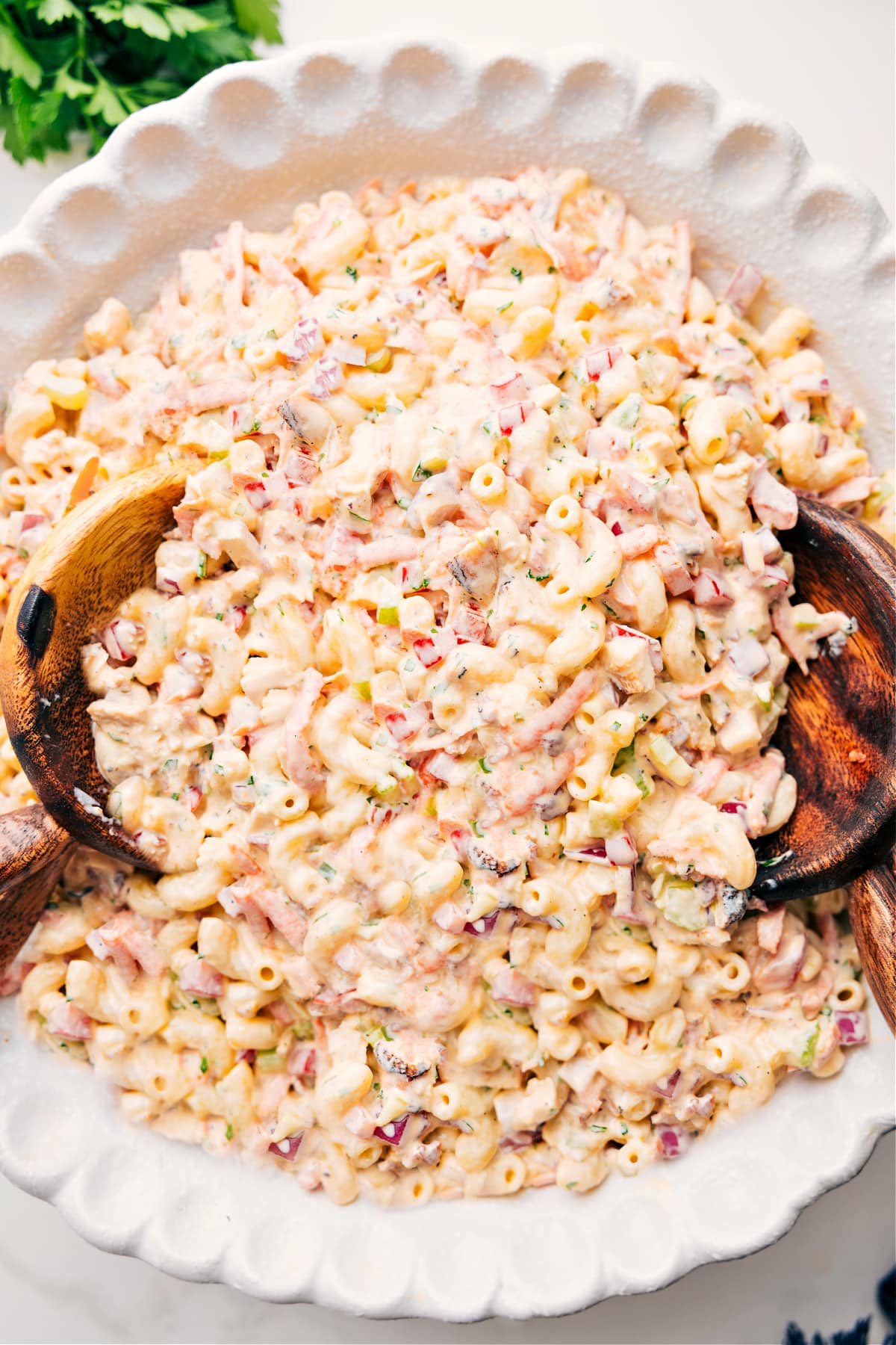 The Yummiest Pasta Salad: Chicken Macaroni Salad Chicken Macaroni Salad tossed in a large bowl, ready to serve and enjoy.