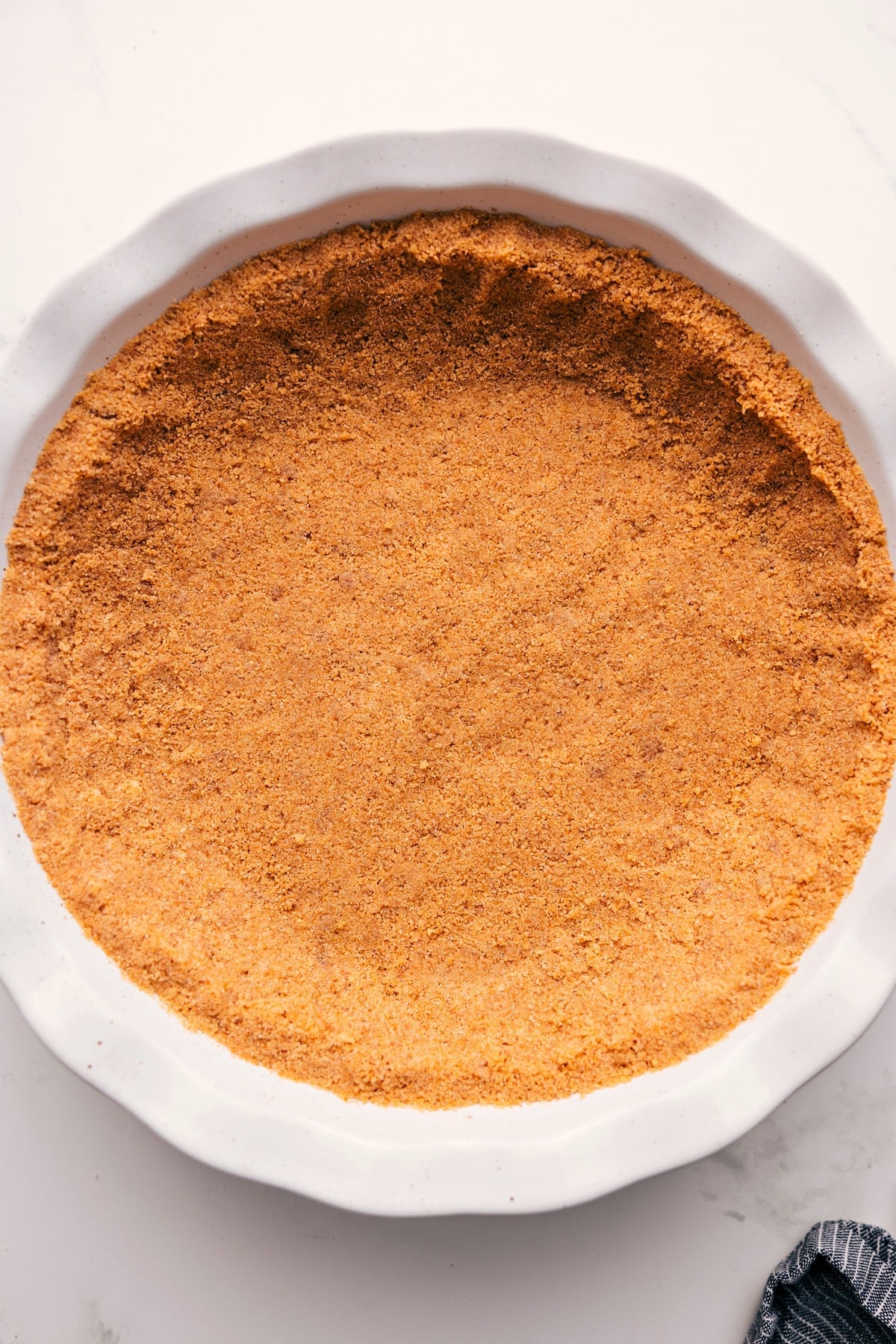 Homemade graham cracker pie crust recipe ready to be filled and served.