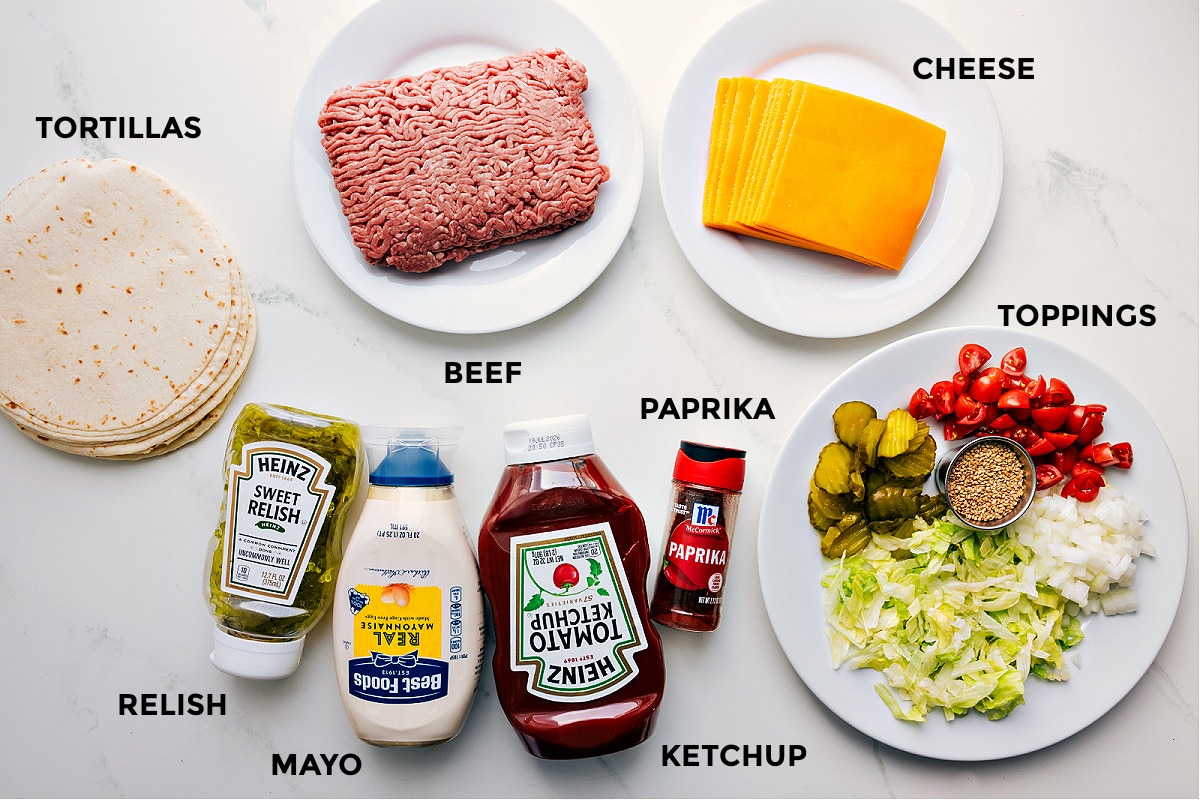 Ingredients In Smash Burger Tacos All the ingredients are prepped and ready for easy assembly. That includes the tortillas, beef, cheese, relish, mayo, ketchup, paprika, and toppings.
