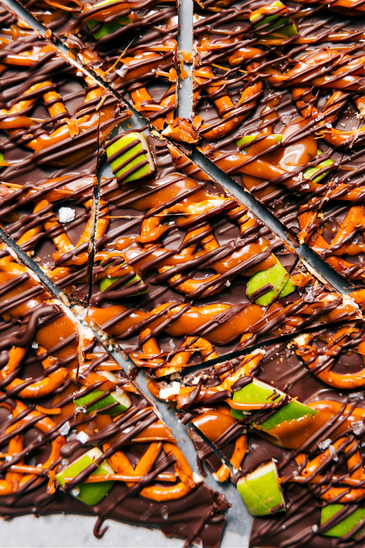 Caramel Apple Bark pieces cut into squares and ready to serve.