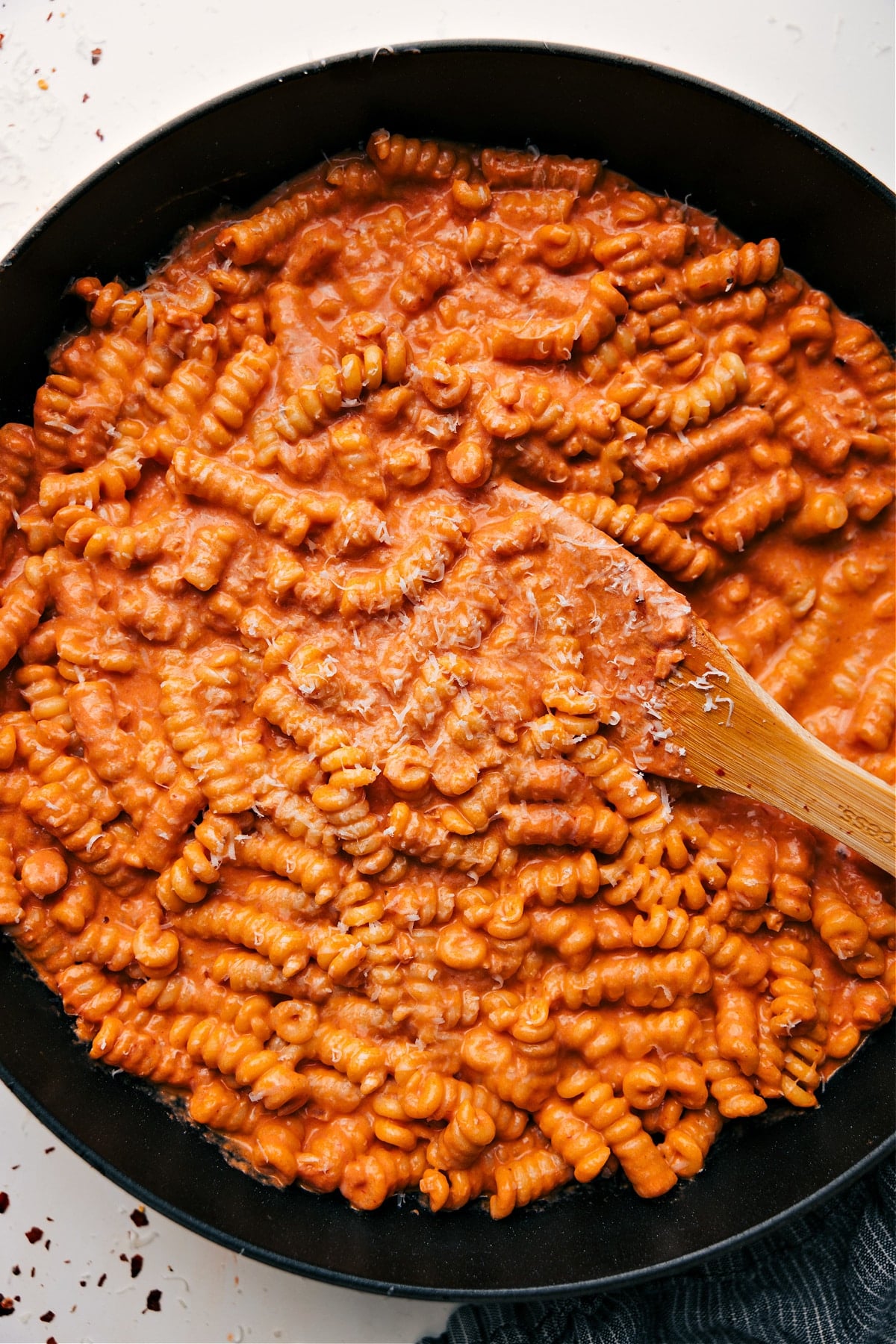 Creamy tomato pasta recipe in a pot with a rich sauce, ready to serve.