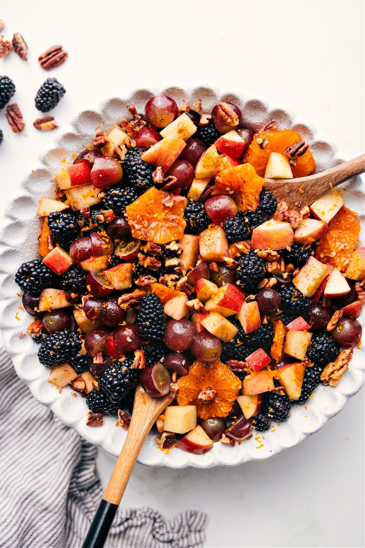 Easy And Flavorful Fall Fruit Salad Recipe Fall Fruit Salad in a large bowl tossed with sweet dressing, ready to be served and enjoyed.