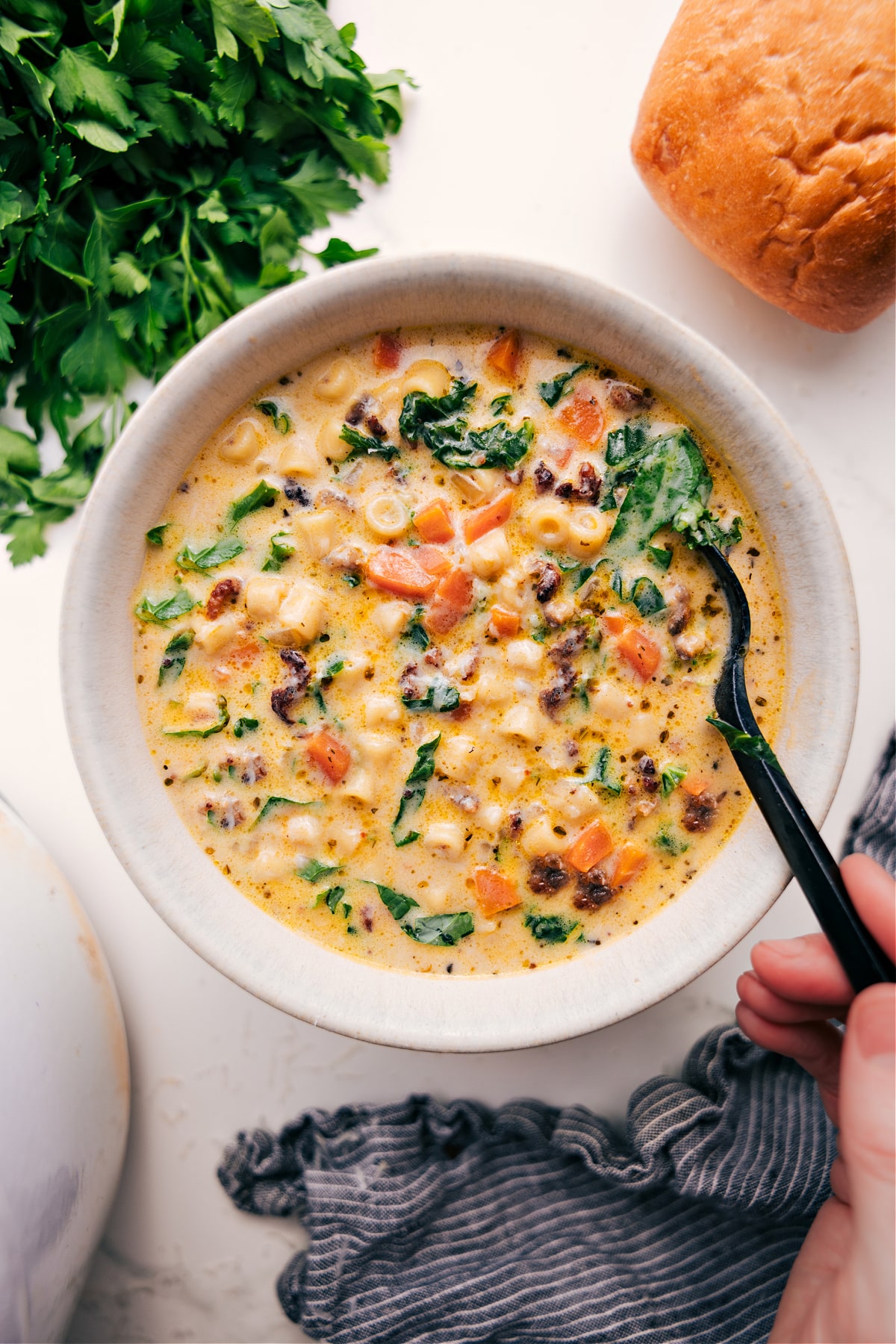 The soup in a bowl ready to be enjoyed with some crusty bread on the side.