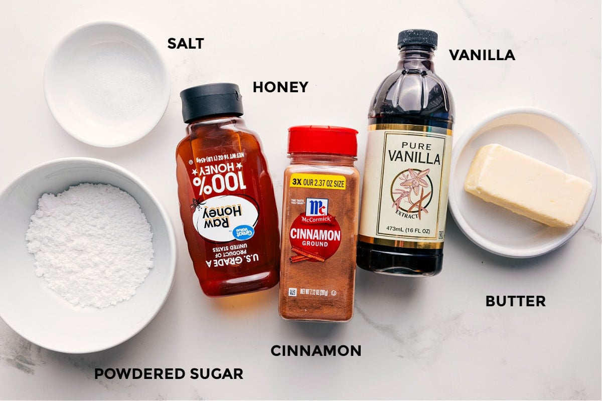 Ingredients In Honey Butter Recipe All the ingredients in this recipe prepped out for easy assembly including the powdered sugar, honey, cinnamon, vanilla, and butter.