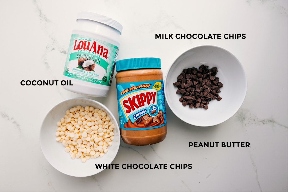 Ingredients In Peanut Butter Meltaways All the ingredients in this recipe prepped out for easy assembly including the oil, chocolate chips, and peanut butter.