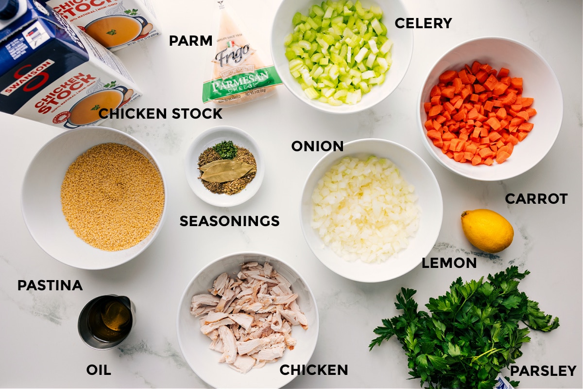 Ingredients In Pastina Soup All the ingredients in this recipe prepped out for easy assembly including chicken stock, pastina, oil, parm, seasonings, chicken, and veggies.