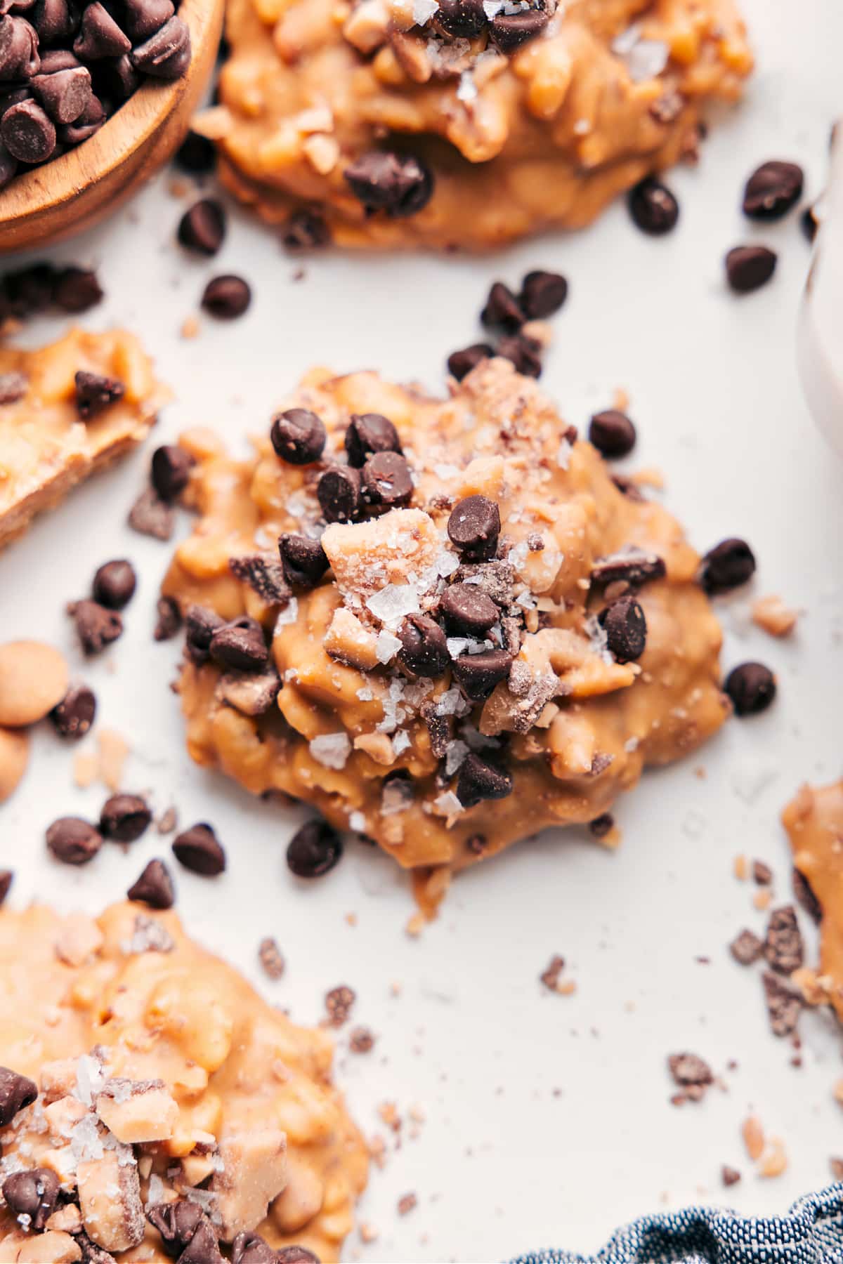 White Chocolate Pretzel Clusters with added mini chocolate chips and flaky sea salt on top.