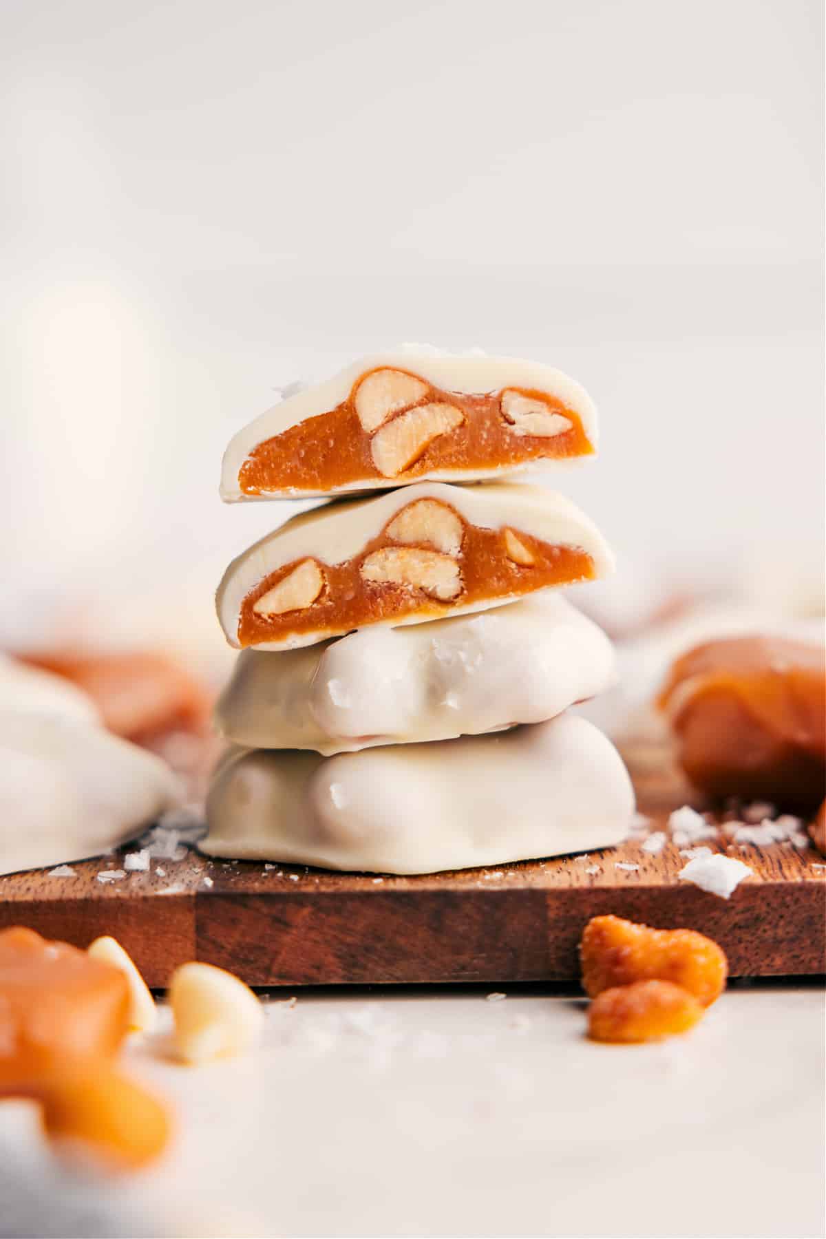 See's Candies Copycat: Polar Bear Paws Polar Bear Paws stacked on top of each other with the top ones cut in half to show the inside.