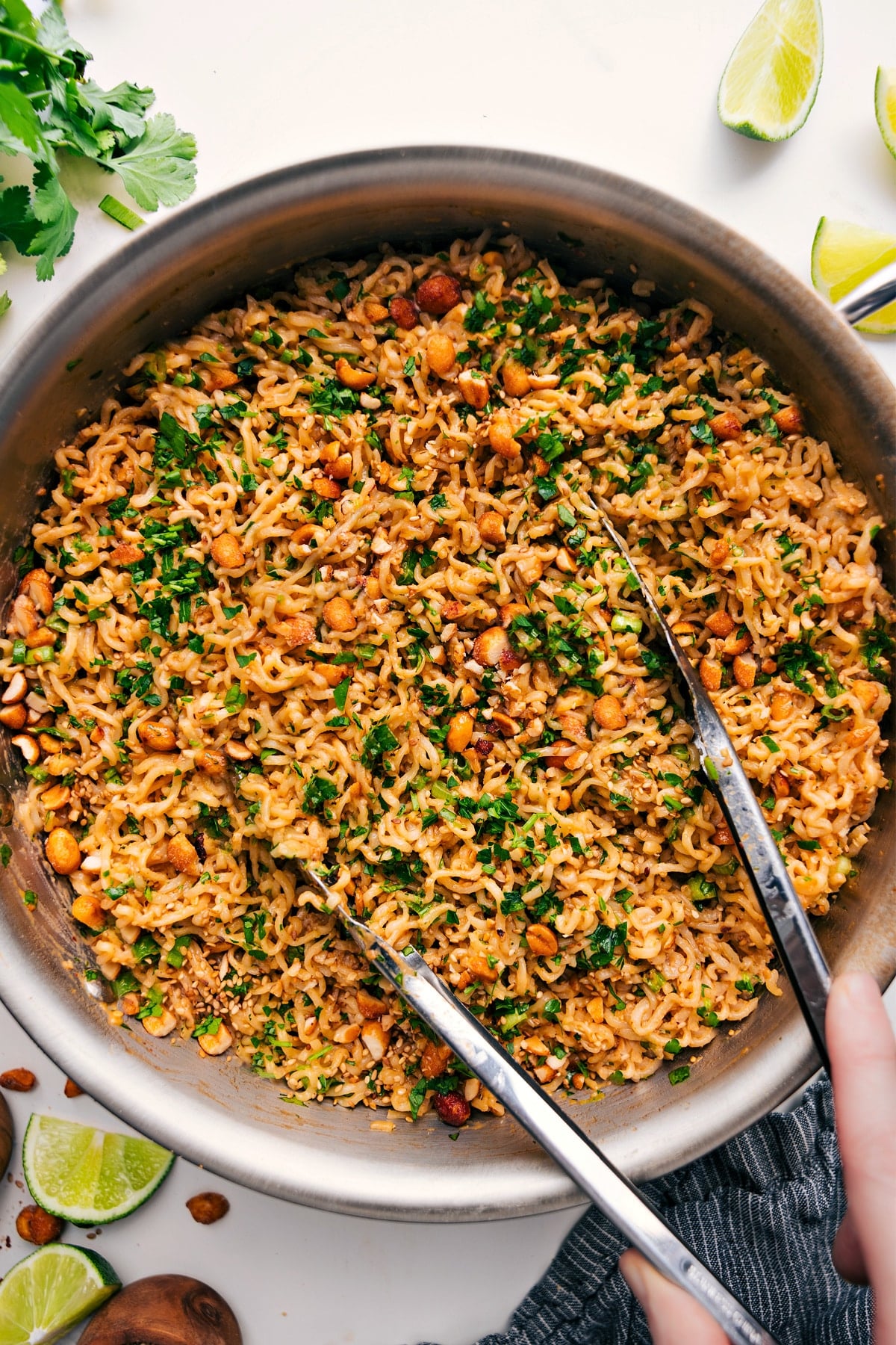 Peanut Butter Ramen in a pot topped with fresh cilantro, ready to be served.