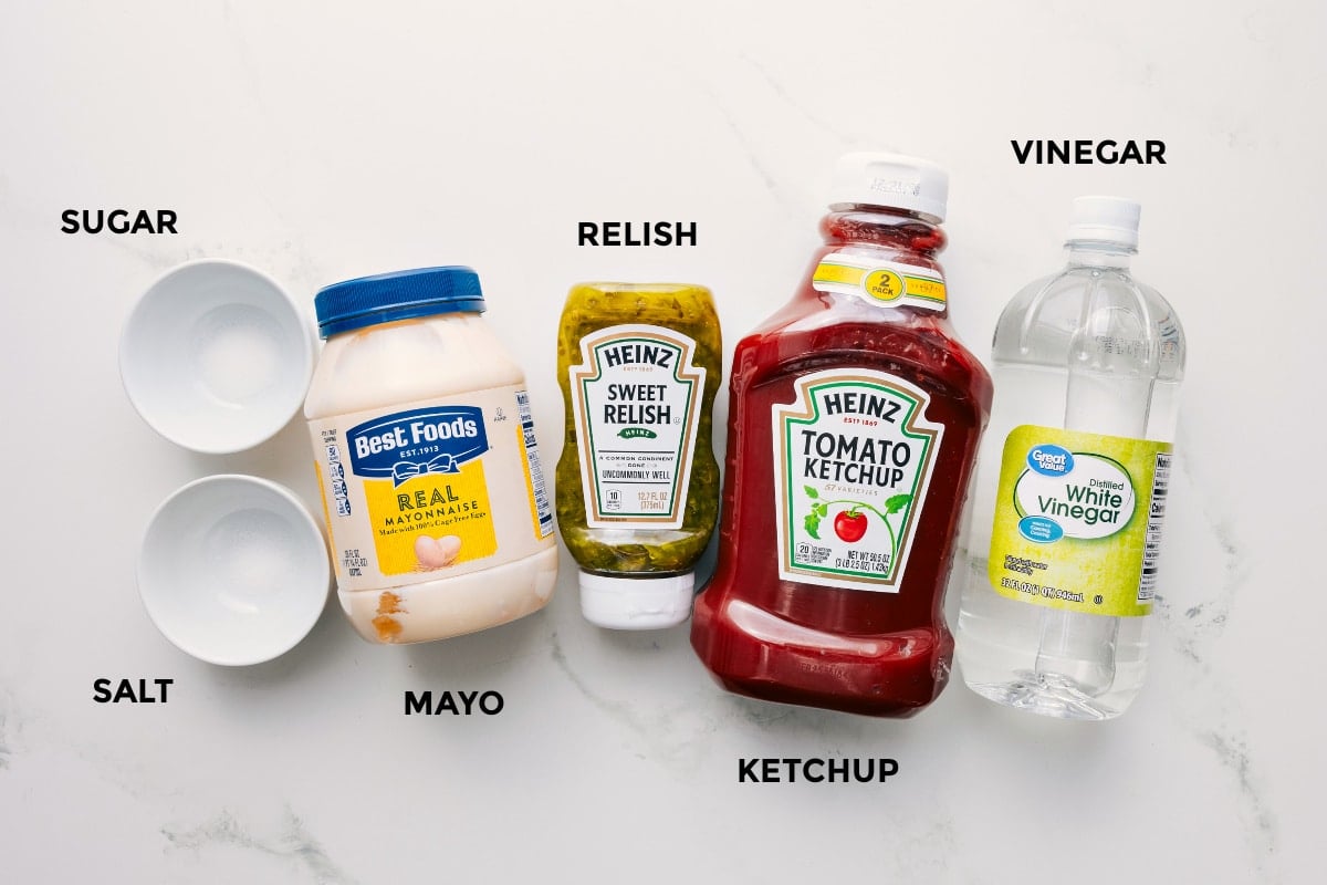 Ingredients In In-N-Out Sauce Recipe All the ingredients in this recipe prepped out for easy assembly including the sugar, salt, mayo, relish, ketchup, and vinegar.