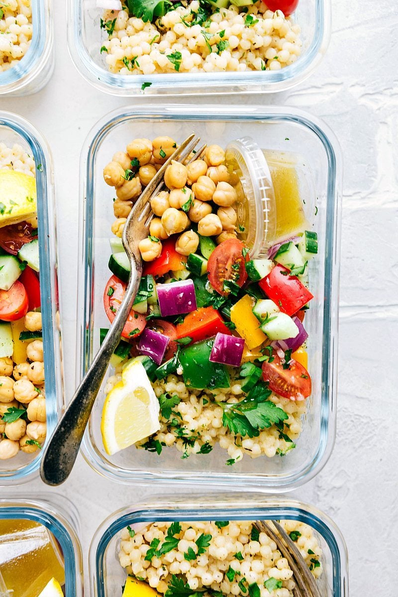 Greek Couscous Salad Greek couscous salad in meal prep containers.