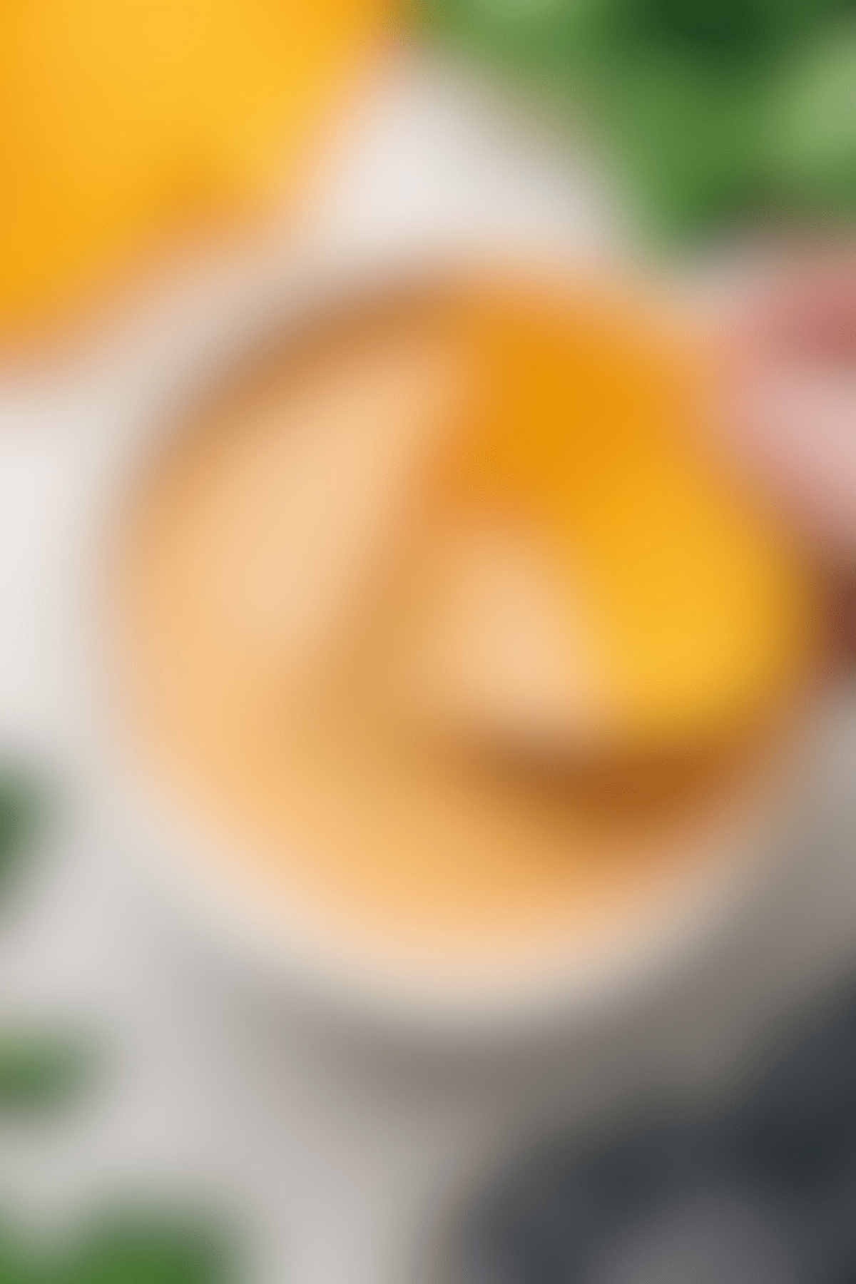 Bajio queso recipe with a chip dipping in.