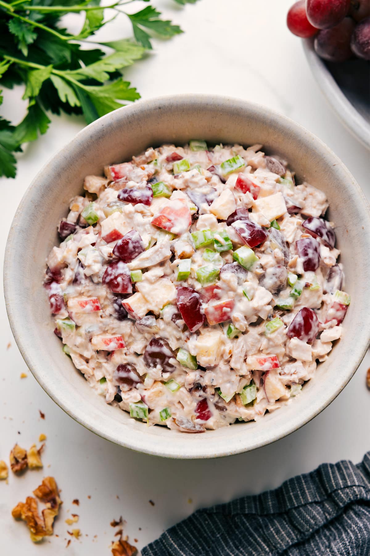 Waldorf Chicken Salad in a bowl tossed together and ready to enjoy.